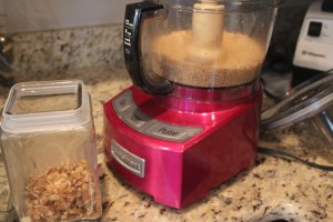 Pulse your walnuts in your food processor.