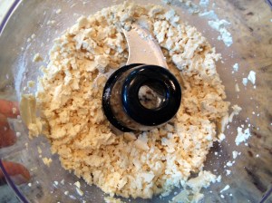 Pulse your tofu and baking powder a few times in the food processor.