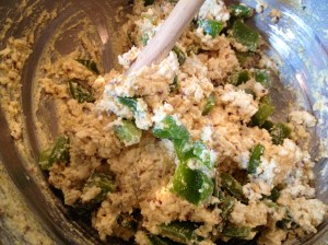 Add cooked peppers. Stir.