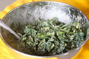 This is "massaged" kale. Yes, use your clean (obviously) hands and rub the dressing into those fibers.