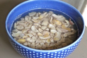 Start by soaking 1 1/2 cups cashews for a couple of hours. This will soften them enough to make your cashew cream.