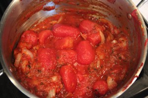 In went the can of roma tomatoes.