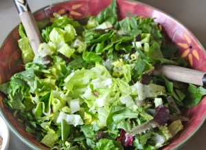 A chopped a mixture of romaine lettuce and mixed greens.