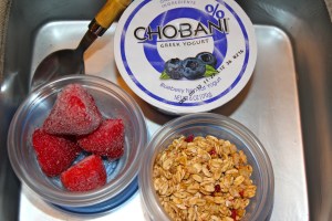 DIY parfait. Sort of. No fancy glass here. Yes, those strawberries are frozen, but come lunchtime they will be perfect for mixing with greek yogurt and topping with granola.