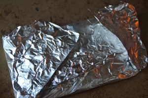 Wrap each tortilla in foil and place on baking sheet.