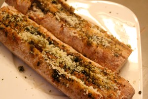 Brush, spread, or scoop your pesto into the bread in the openings where you just sliced. I used a pastry brush and also a knife to to spread it in the openings...