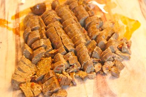 Slice up your sausage into quarters.