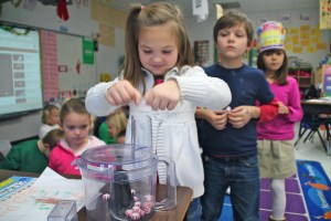 All of the kids lined up and got a turn adding mints to the food processor. I especially like the Trader Joe's mints because there is no gross red dye in them. Score.