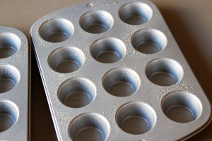 Spray your mini muffin tins....
