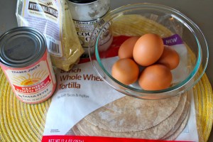 Whole wheat tortilla, organic eggs, vegetarian refried beans, nutritional yeast, and coconut oil