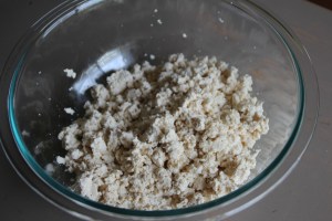 Crumble your pressed tofu.