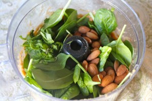 Add your spinach and almonds and process again.