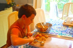 Corbin stirs and scoops our chewies with precision. Well, sort of. They were pretty sticky to work with. 