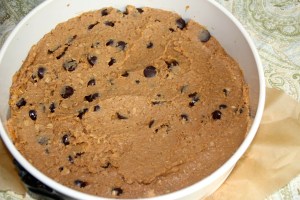 Press cookie dough batter into cheesecake (springform) pan.